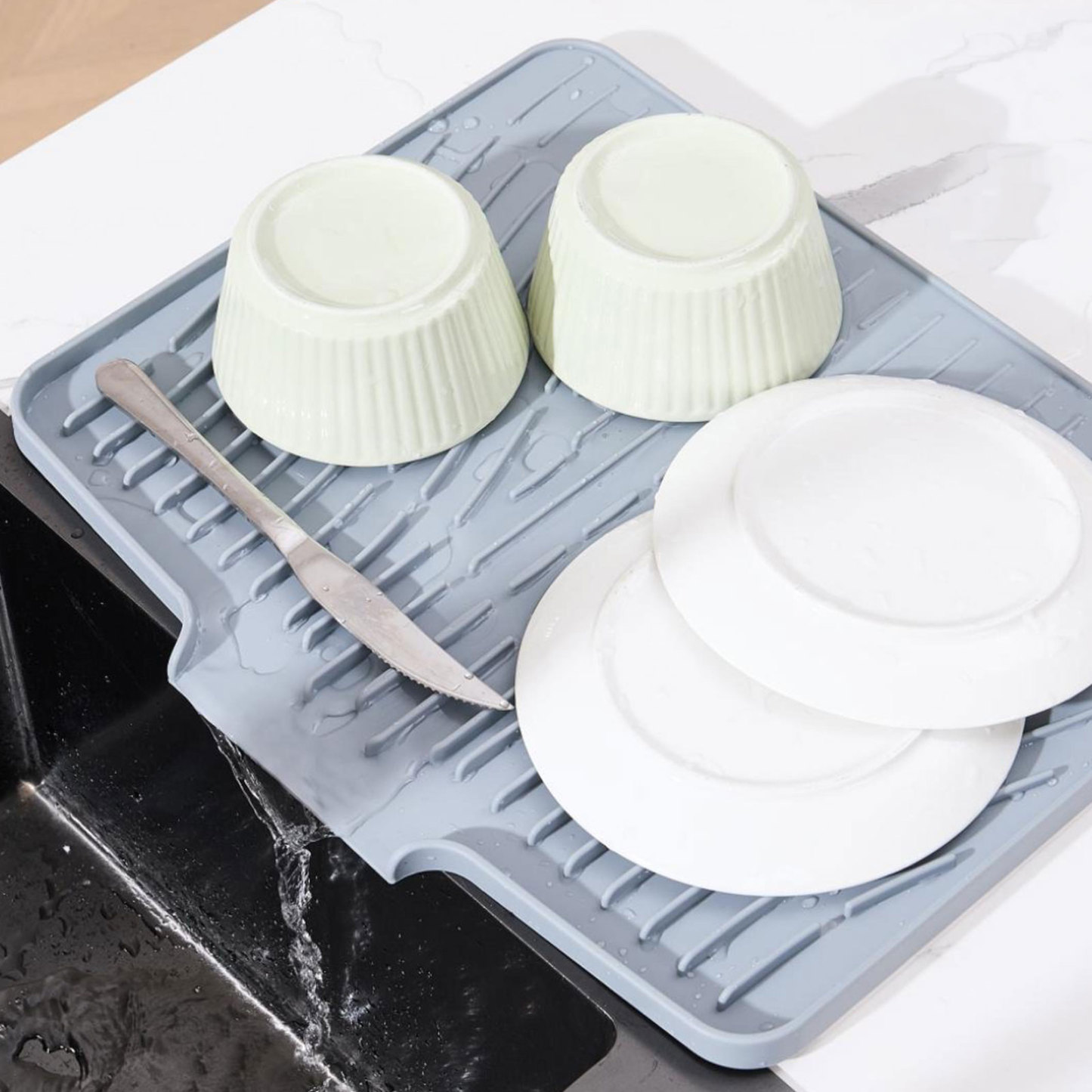 rolled-up silicone dish drying mat for storage