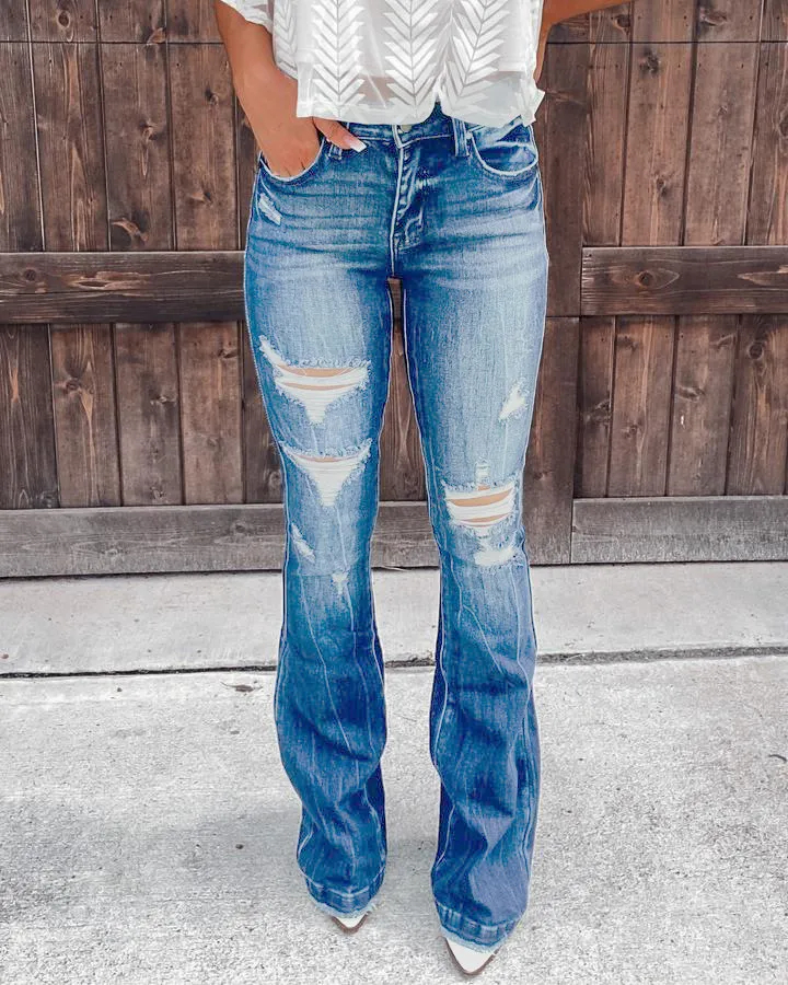 90S VINTAGE DISTRESSED ZIP FLY RAW HEM FLARE LEG JEANS