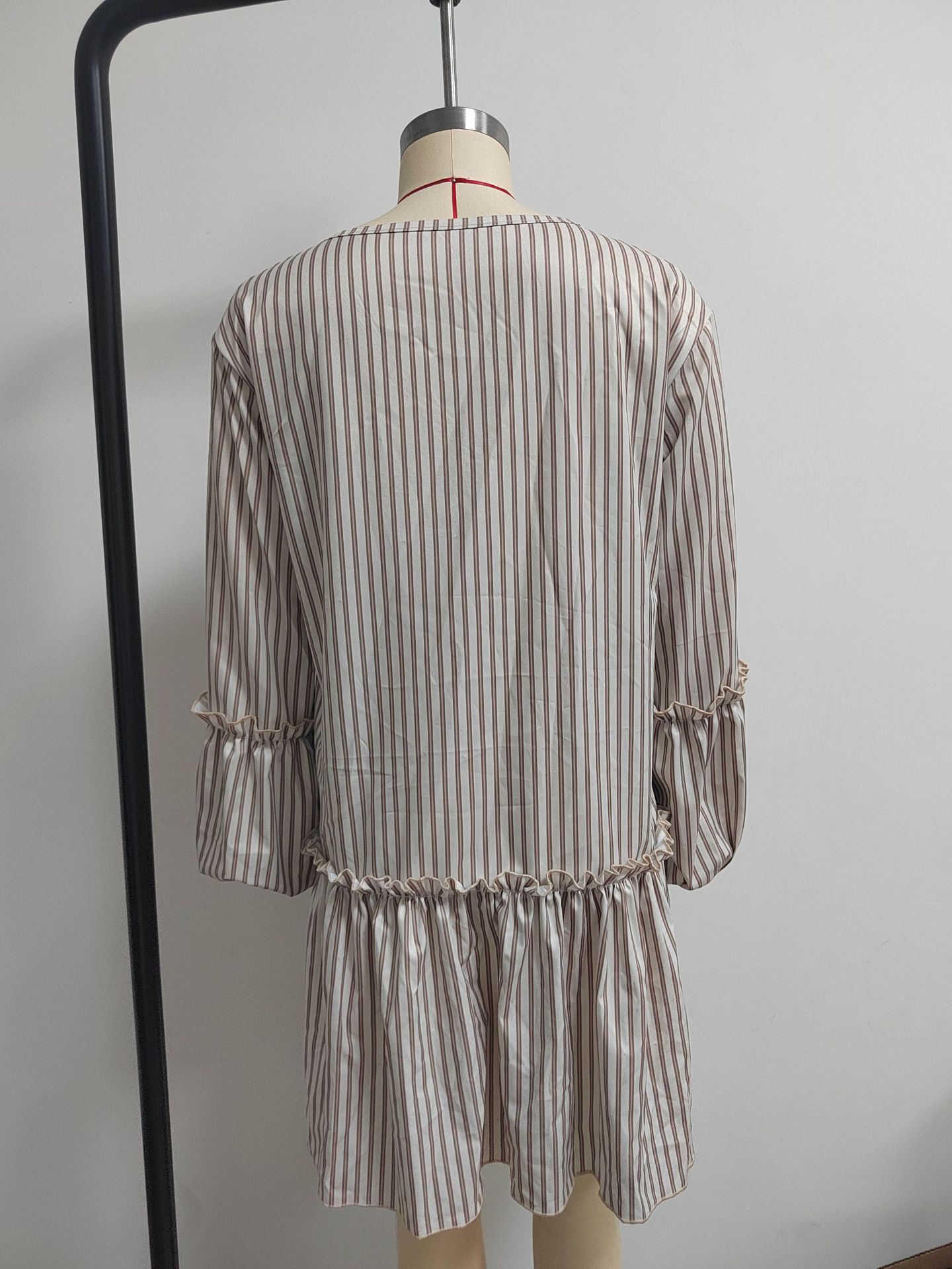 Women's stripe mini dress available in pink, light yellow, light green, light blue, light purple, and khaki