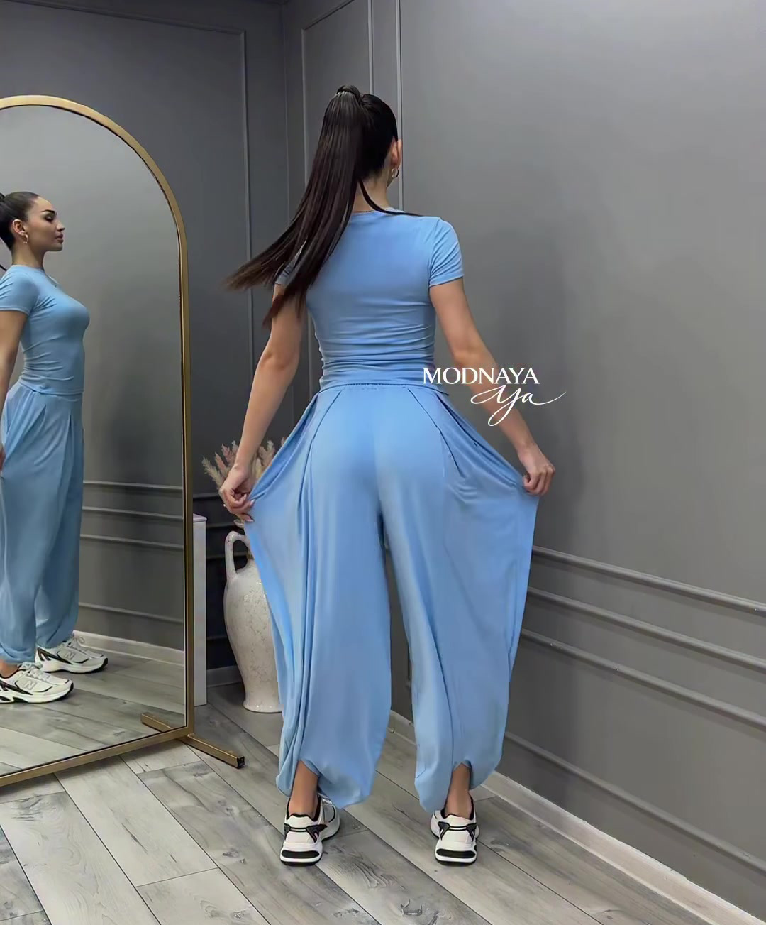 Women's two-piece pants set — complete outfit view