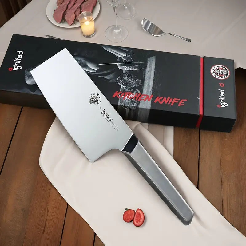 Close-up of the ignited x YEELEN slicing knife's mirror-polished blade and integrated ergonomic handle design.