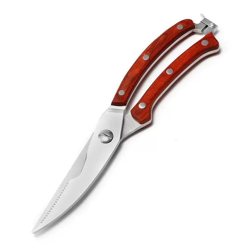 High-resolution image of Ignited Cutlery heavy-duty poultry shears with beautiful wooden handles, showcasing the sharp stainless steel blade and serrated edge.