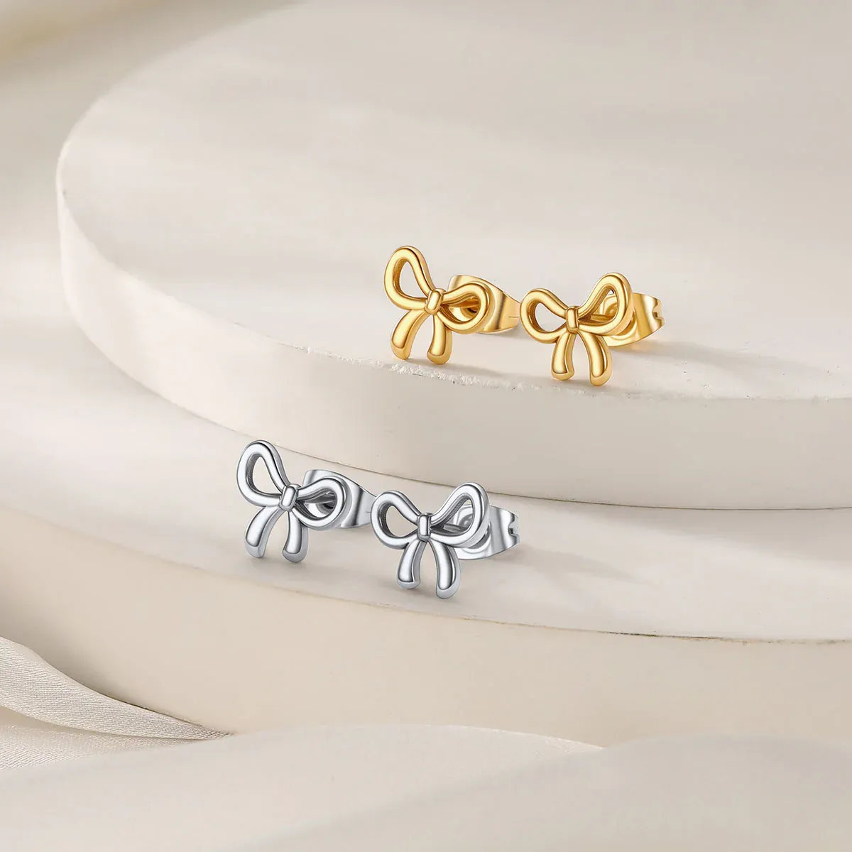 Boucles d’Oreilles Clou Nœud collection