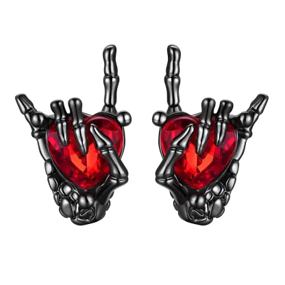 Clous d'Oreilles Main Squelette Rock et Rubis