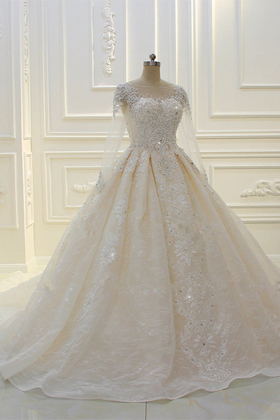 Elegant Beading Ball Gown Long Sleeves Bateau Wedding Dress with Appliques Lace