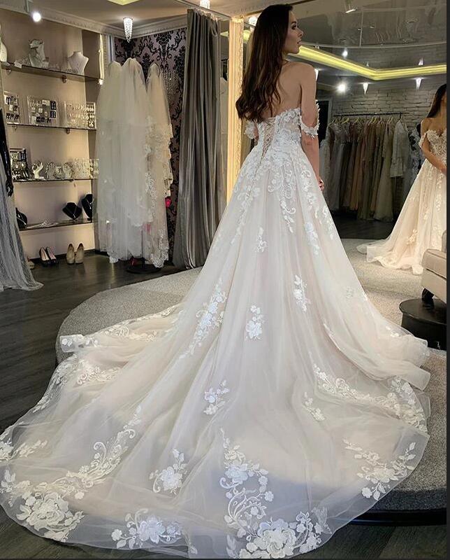 Elegant Long A-Line Tulle Off-the-Shoulder Wedding Dress with Lace Appliques