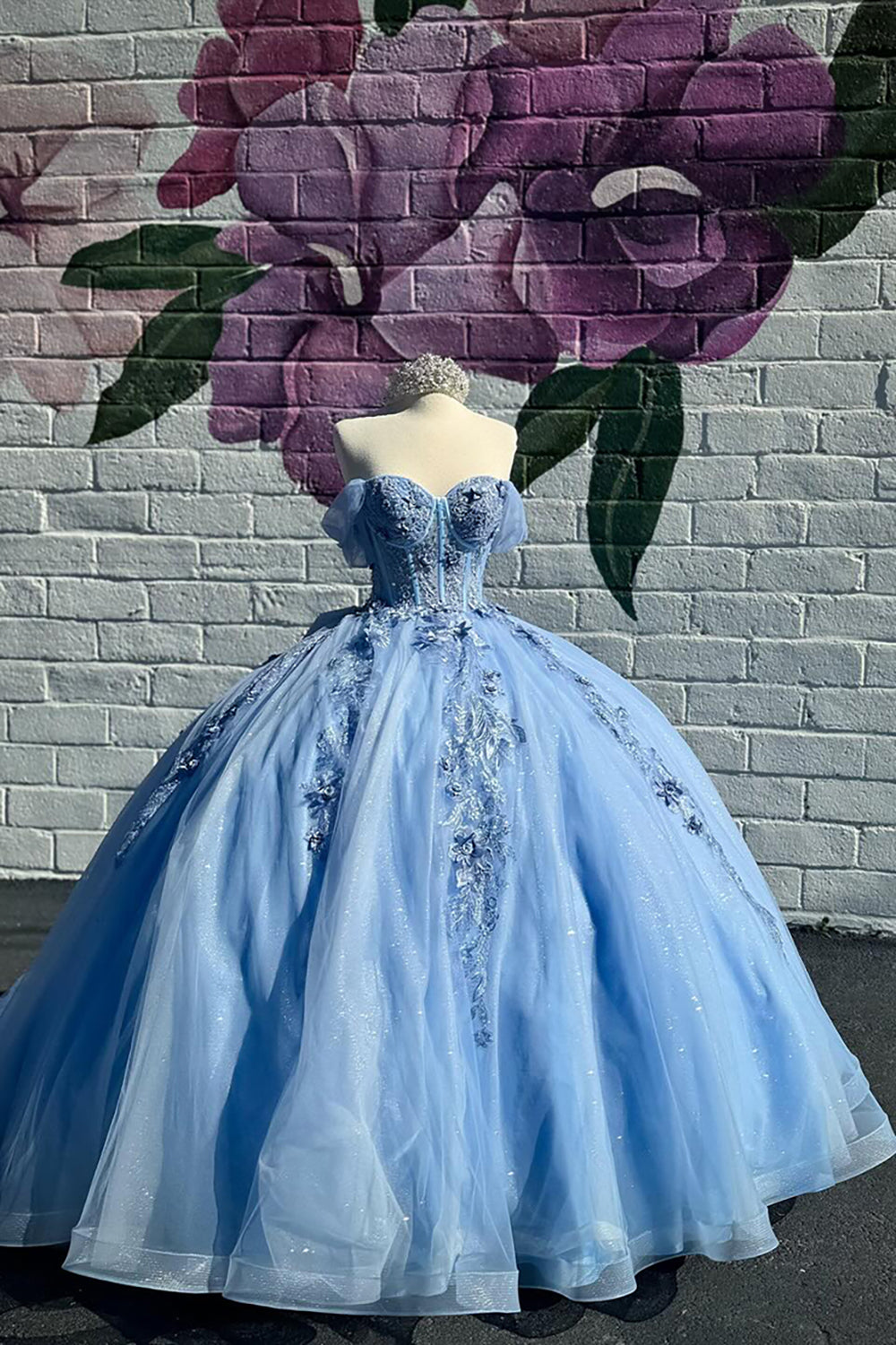 Off the Shoulder Blue Princess Organza Quinceanera Dress Featuring a Bow and Applique
