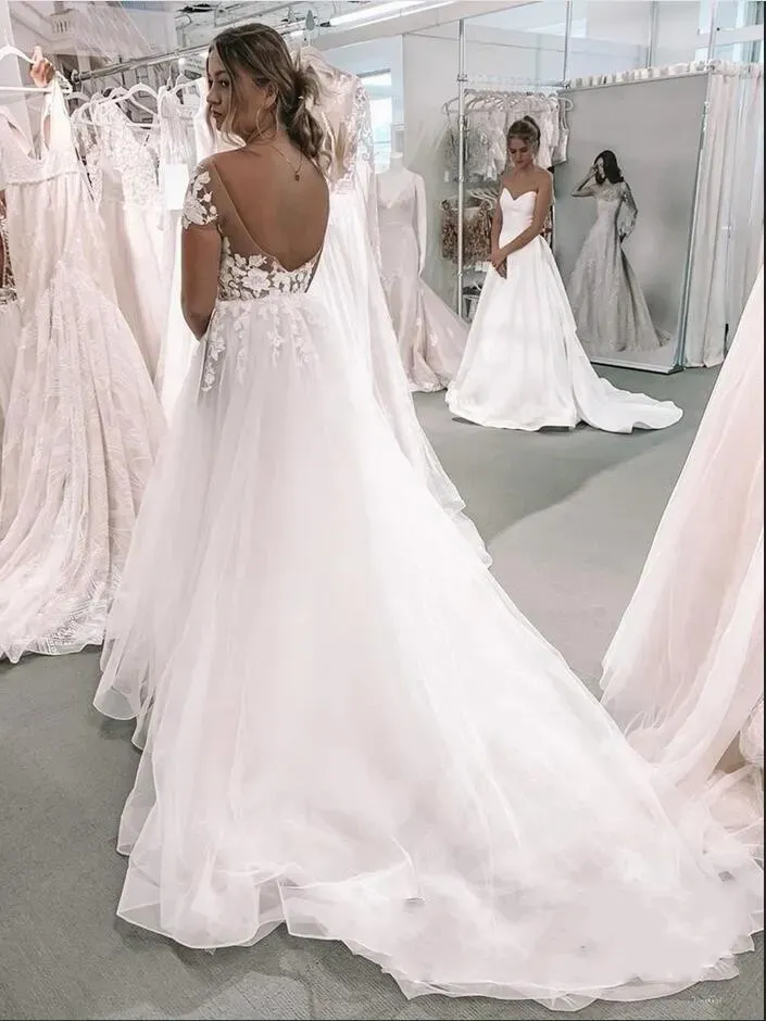 Modern Short Sleeves Floor-Length Bateau Tulle A-Line Wedding Dress with Appliques Lace