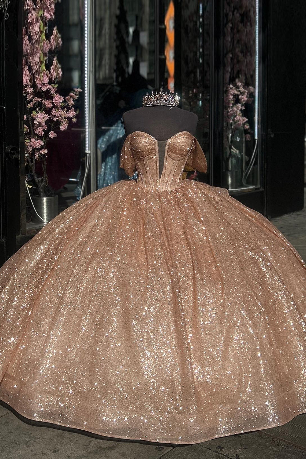 Champagne Sparkle Off-Shoulder Tulle Quinceanera Dress Featuring Ruffles and Bow