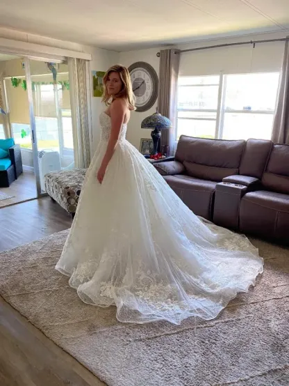 Elegant A-Line Off-the-Shoulder Lace Wedding Dress with Appliques Beads