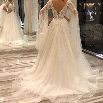 Gorgeous Short Sleeves Backless Floor-Length A-Line Deep V-Neck Wedding Dress with Appliques Lace Pearl