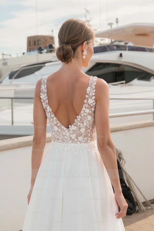 Flowing Long Ivory V-Neck Sleeveless A-Line Wedding Dress with Appliques