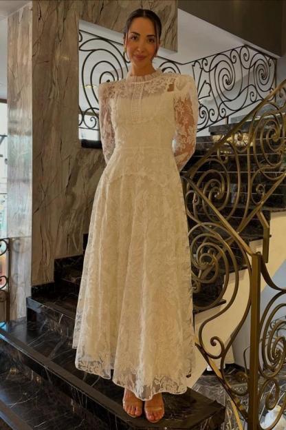 Ivory A-Line Wedding Dress High Neck Pearl Button Long Sheer Lace Sleeves Ruffle Cuff Allover Lace Victorian Modest Bridal Gown