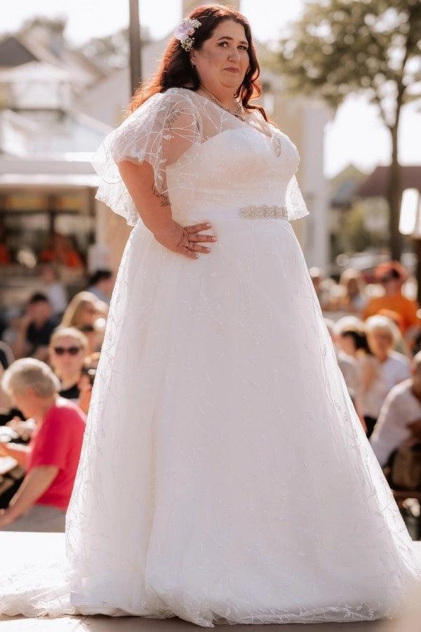 Plus Size White A-Line Wedding Dress V Neck Flutter Cape Sleeves Floral Embroidery Crystal Belt Glitter Tulle Bridal Gown with Sweep Train