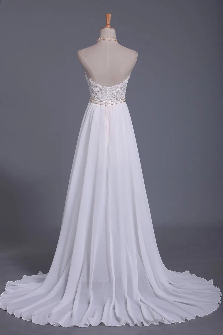 Gorgeous Chiffon A-Line Floor-Length Backless Halter Wedding Dress with Ruffles Pearl Lace
