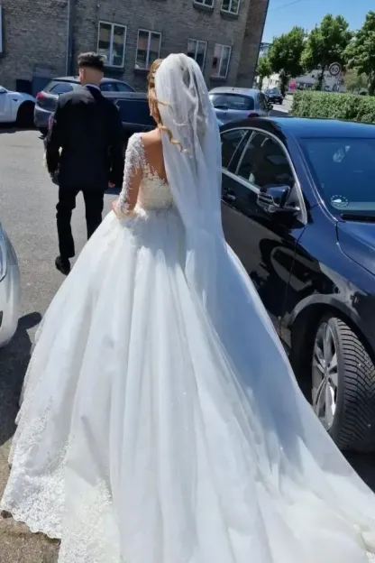 Stunning White V-Neck Lace A-Line Wedding Dress with Long Sleeves