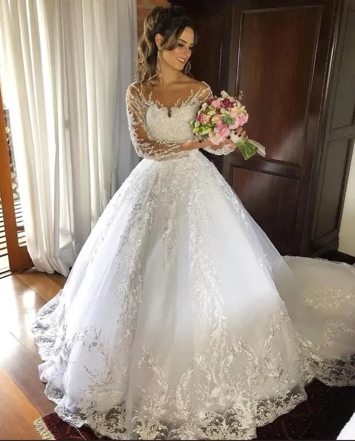Charming Long Sleeves Princess Tulle Wedding Dress with Appliques