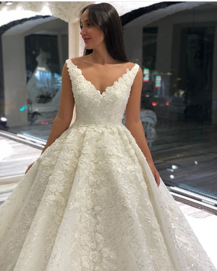 Gorgeous Floor-Length A-Line Sequins Deep V-Neck Wedding Dress with Appliques Lace