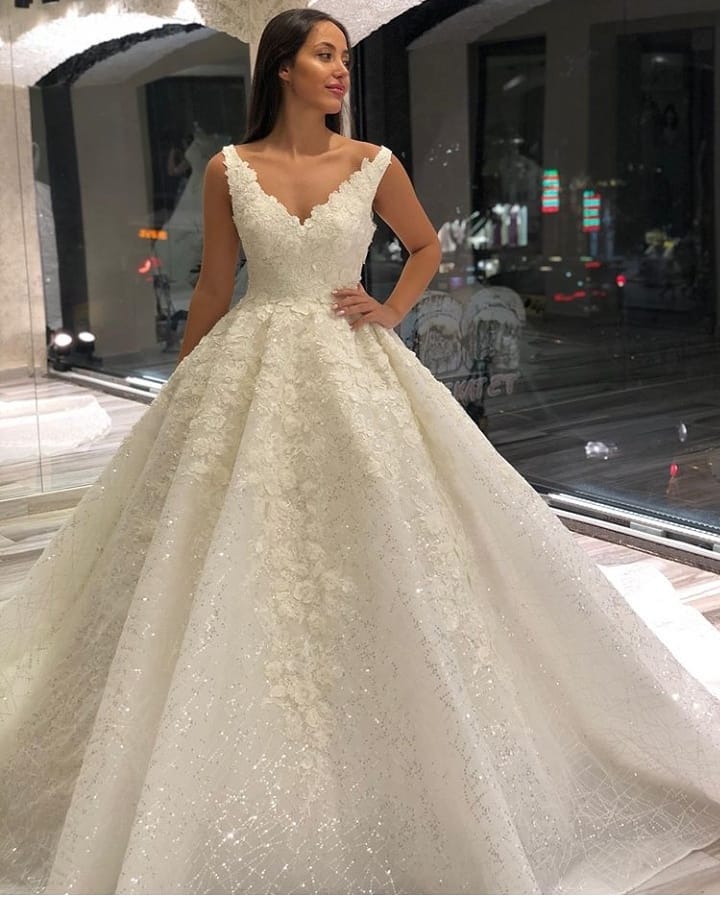 Gorgeous Floor-Length A-Line Sequins Deep V-Neck Wedding Dress with Appliques Lace