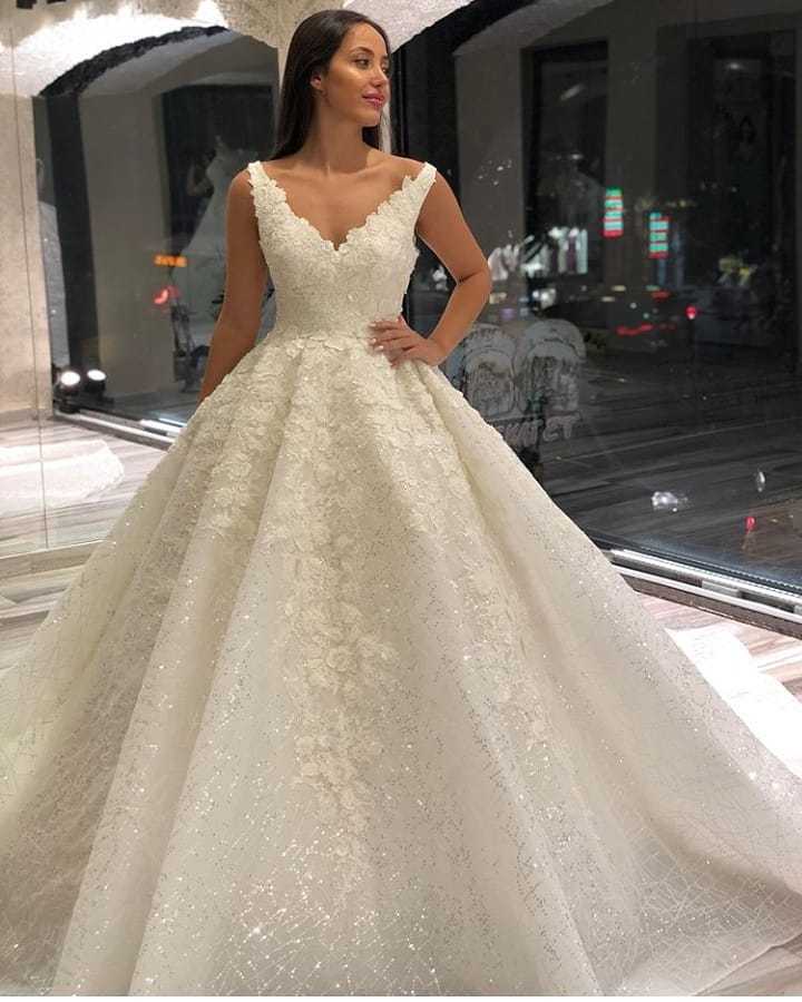 Gorgeous Floor-Length A-Line Sequins Deep V-Neck Wedding Dress with Appliques Lace