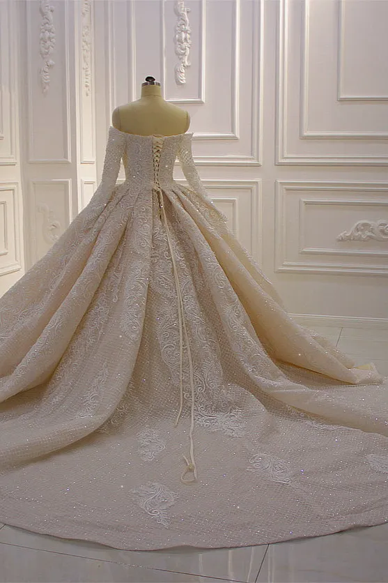 Stunning Ball Gown Off-the-Shoulder Long Sleeves Wedding Dress with Appliques Lace