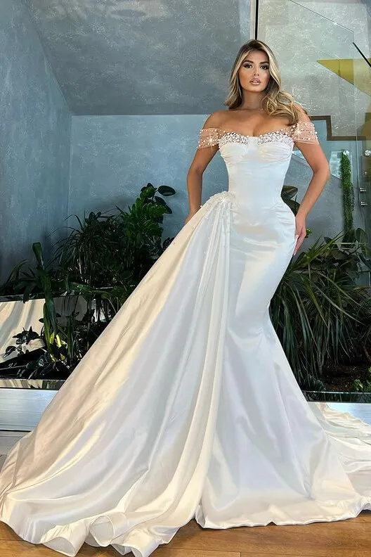 Classic Satin Off-the-Shoulder White Mermaid Wedding Dress with Ruffles and Pearls