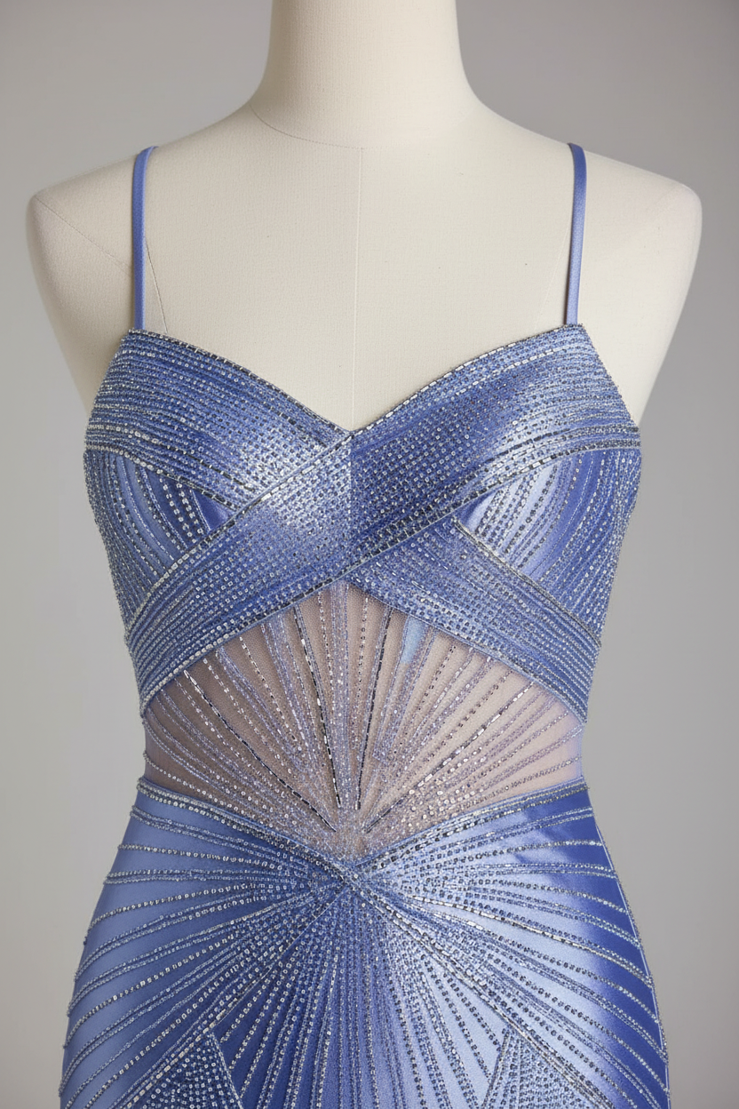 Close-up of geometric beaded bodice with sheer midriff
