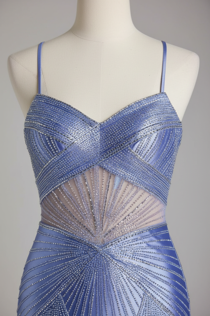 Close-up of geometric beaded bodice with sheer midriff