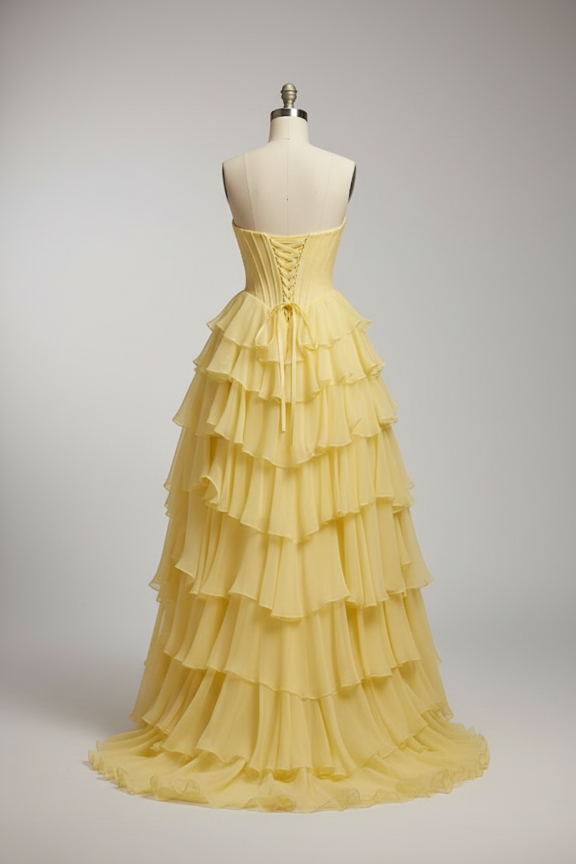 Yellow tiered ruffle ball gown - corset back view