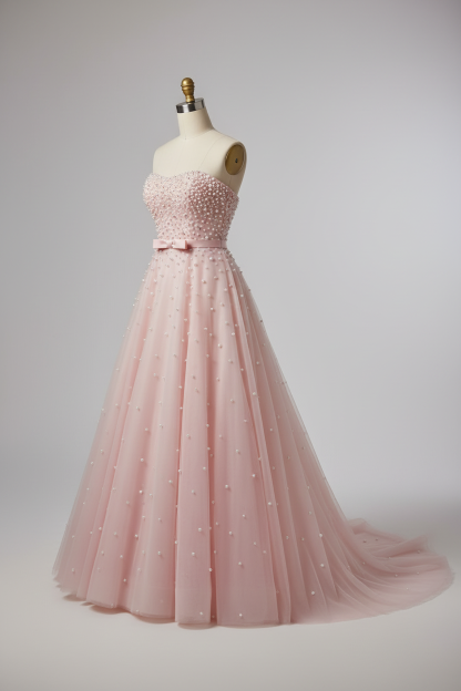 Pink pearl beaded ball gown - side view