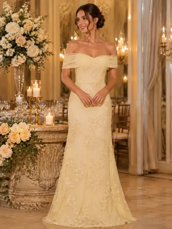 Bridesmaid wearing an elegant illusion sleeve dress showing sheer mesh fabric details and a sophisticated wedding style