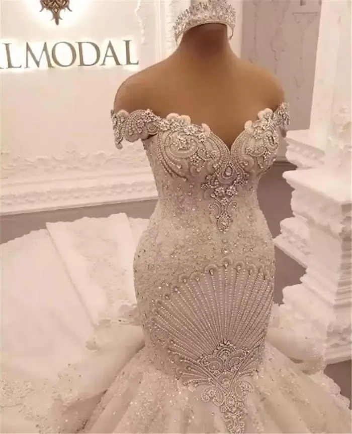 Gorgeous Beading Mermaid Wedding Dresses Bridal Gowns 2026 Lace Appliqued Off The Shoulder Tiered Sweep Train Arabic robe de mariée