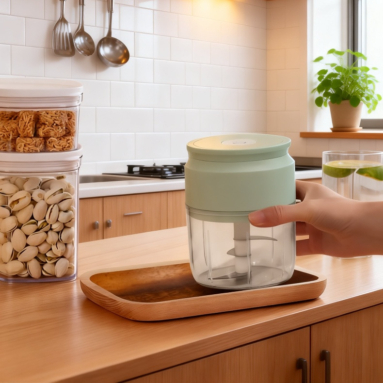 Small electric food processor with garlic cloves