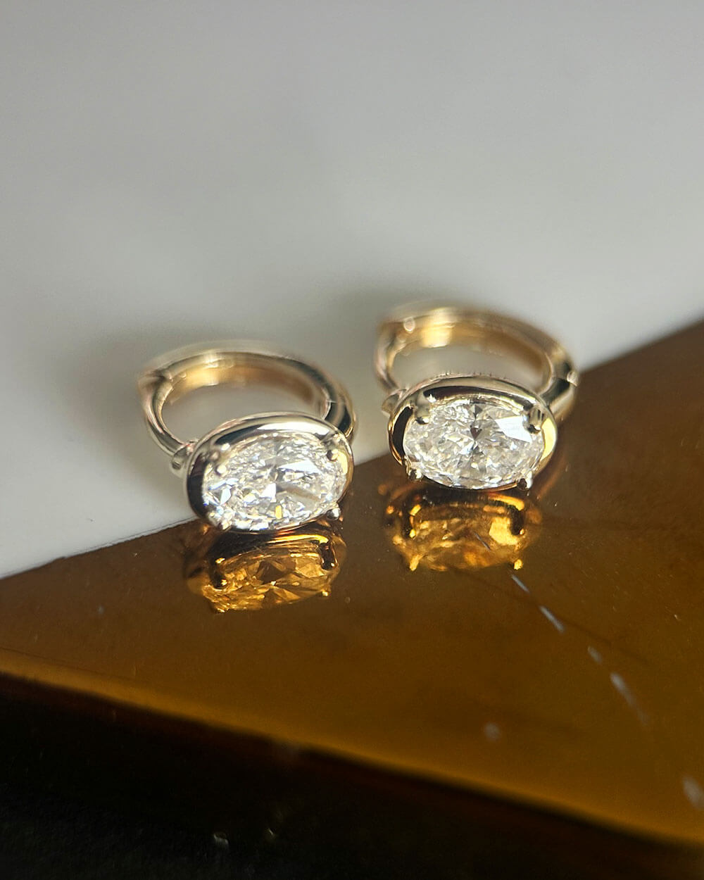 Dual Gleam – Pear & Radiant Diamond Huggie Earrings