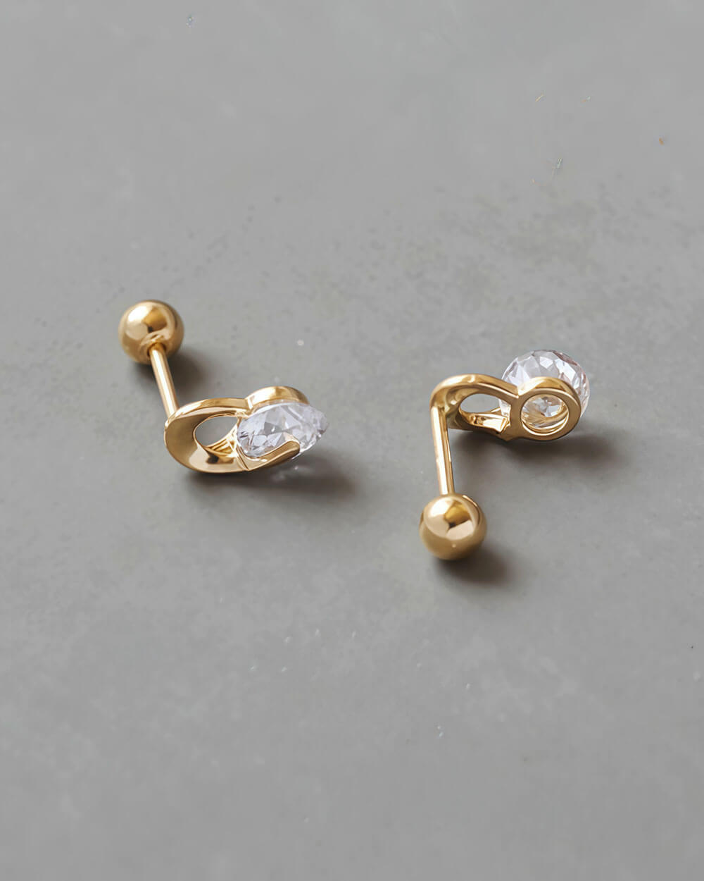 Fortune Orbit – Rotating Diamond Stud Earrings