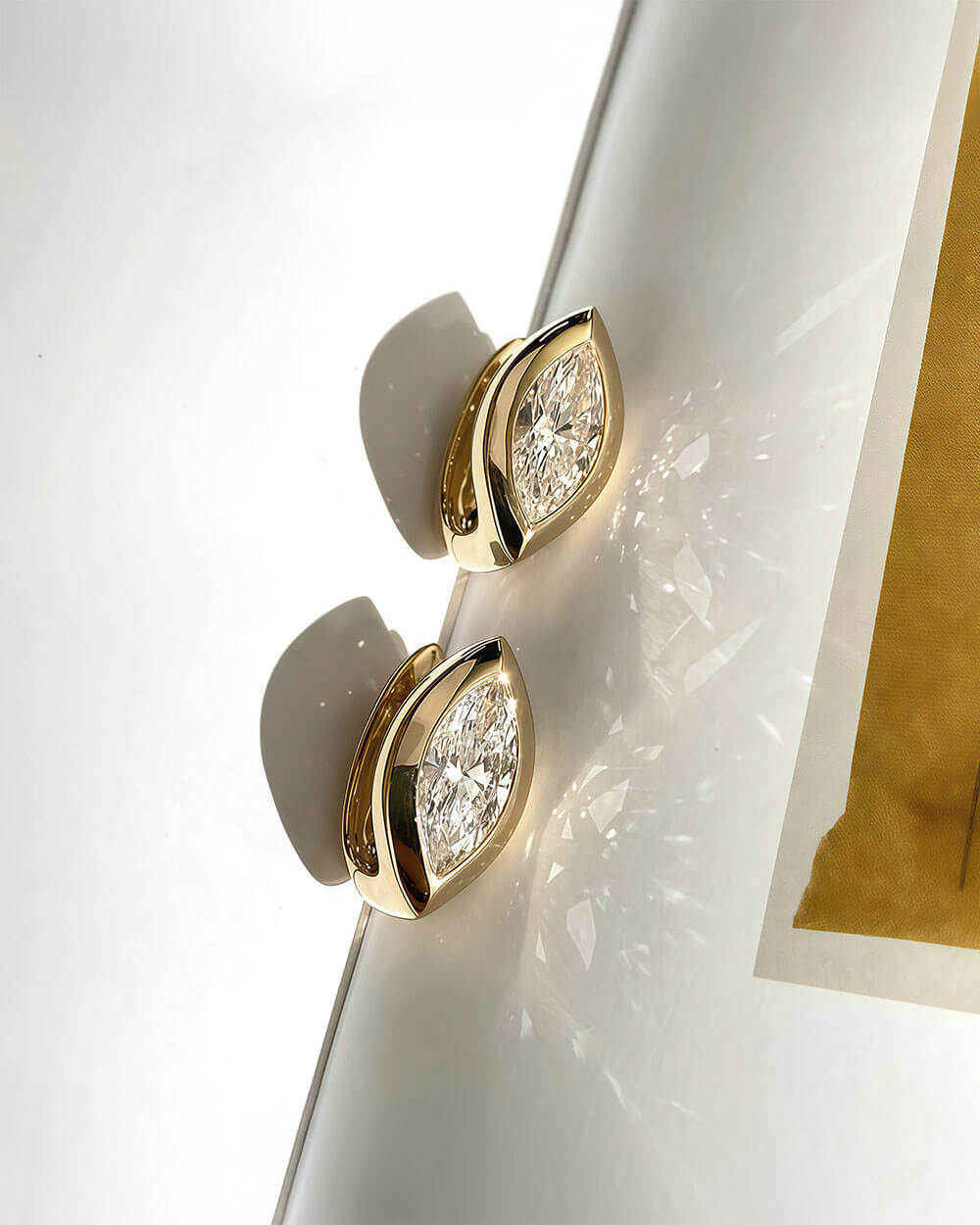 Aurel Arc – Bezel Set Marquise Diamond Huggie Earrings