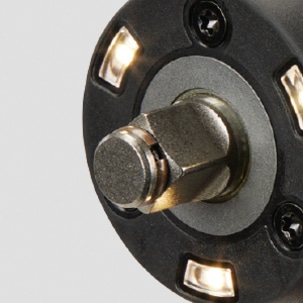 M18 FUEL compact impact wrench holds sockets with just friction for easy socket changes.