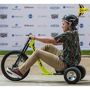Razor; Three Wheeled: Side View Riding on Course