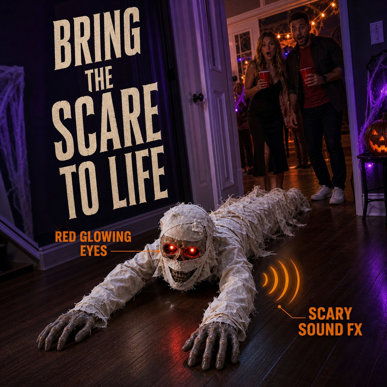 Guests reacting to the crawling mummy at a Halloween party