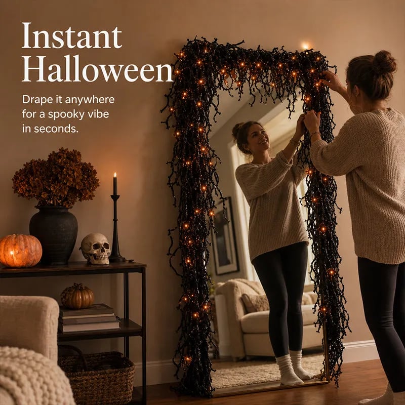 Black Halloween vine fireplace garland for spooky mantel decor