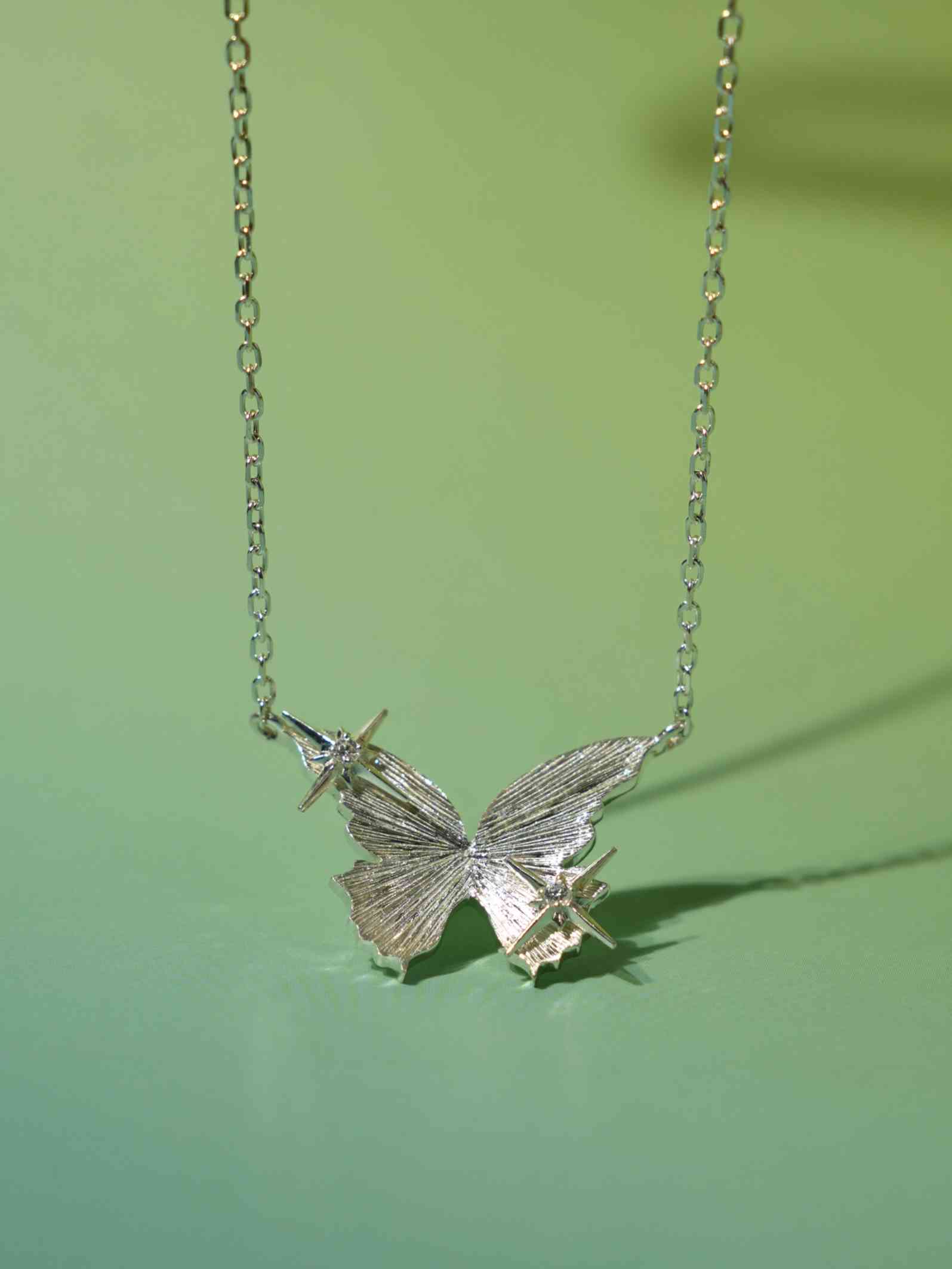 Fireflies·Butterfly Necklace Silver with green background