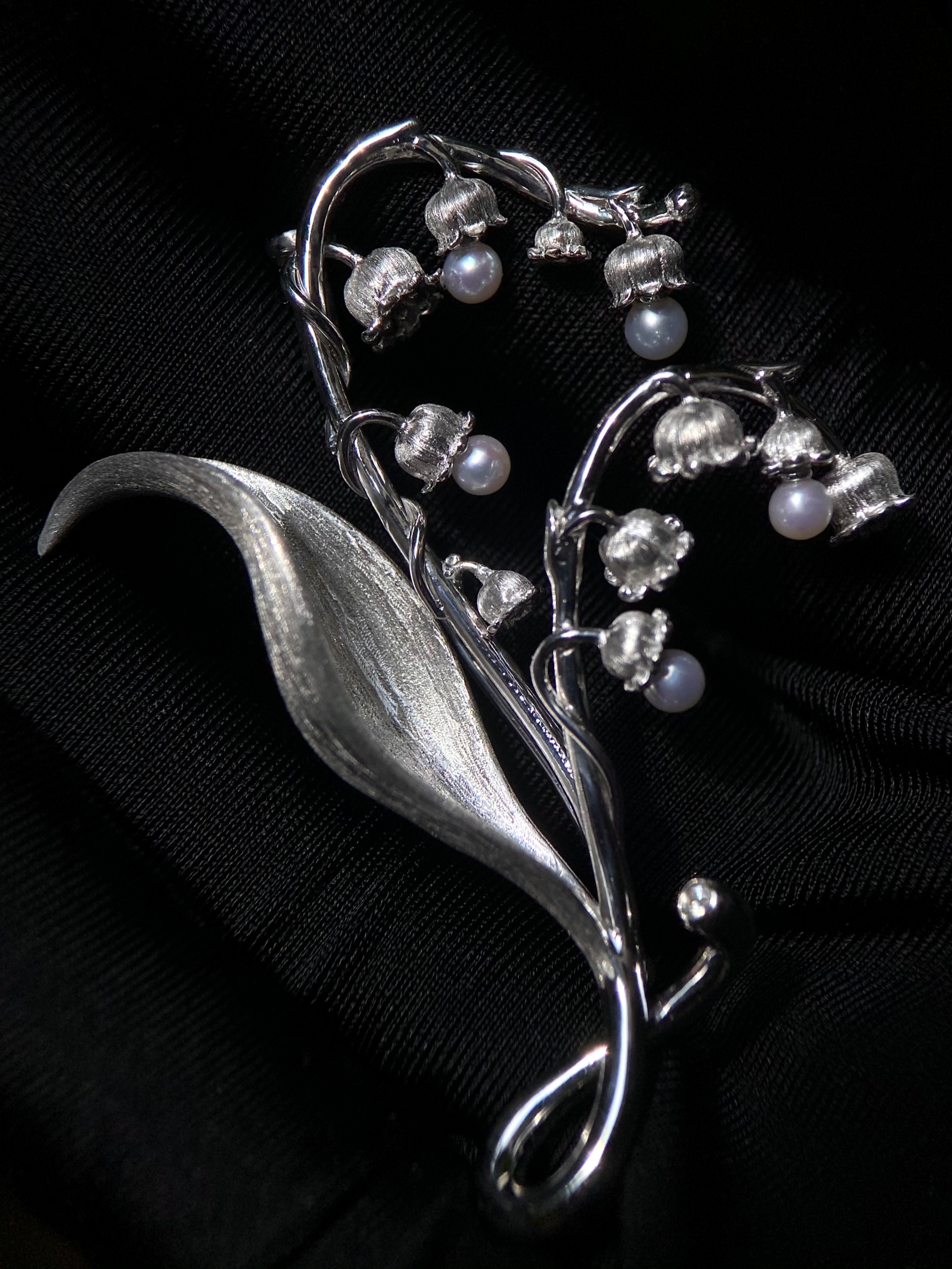 Dewbell Silk- Woven Vines Brooch with black background