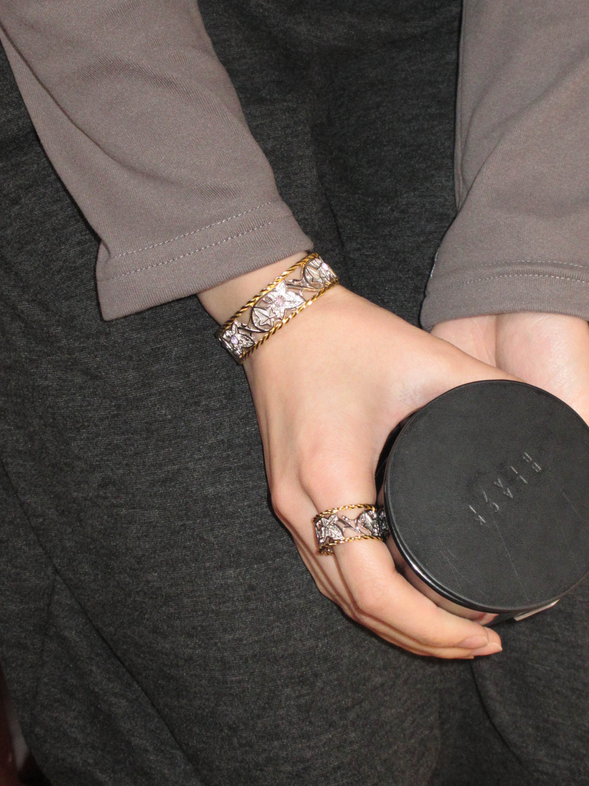 Wearing The Eternal Ivy Openwork Bracelet with a ring from the same collection