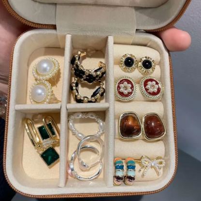 Palm-sized travel jewelry box