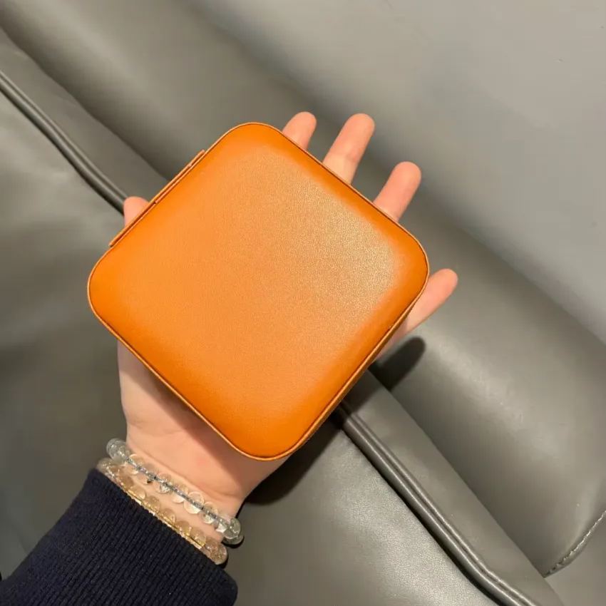 Palm-sized travel jewelry box