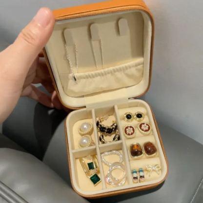 Palm-sized travel jewelry box