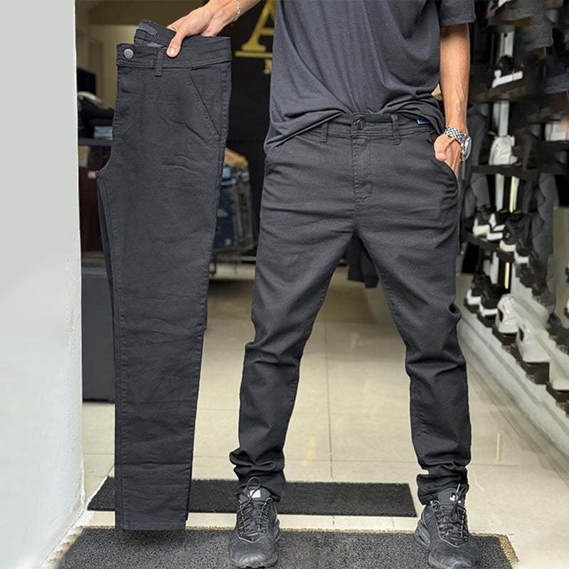 Men's slim-fit casual trousers in a solid color.