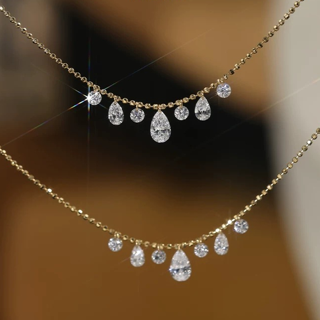 Pear and Round Cut Graduated Floating Diamond Necklace