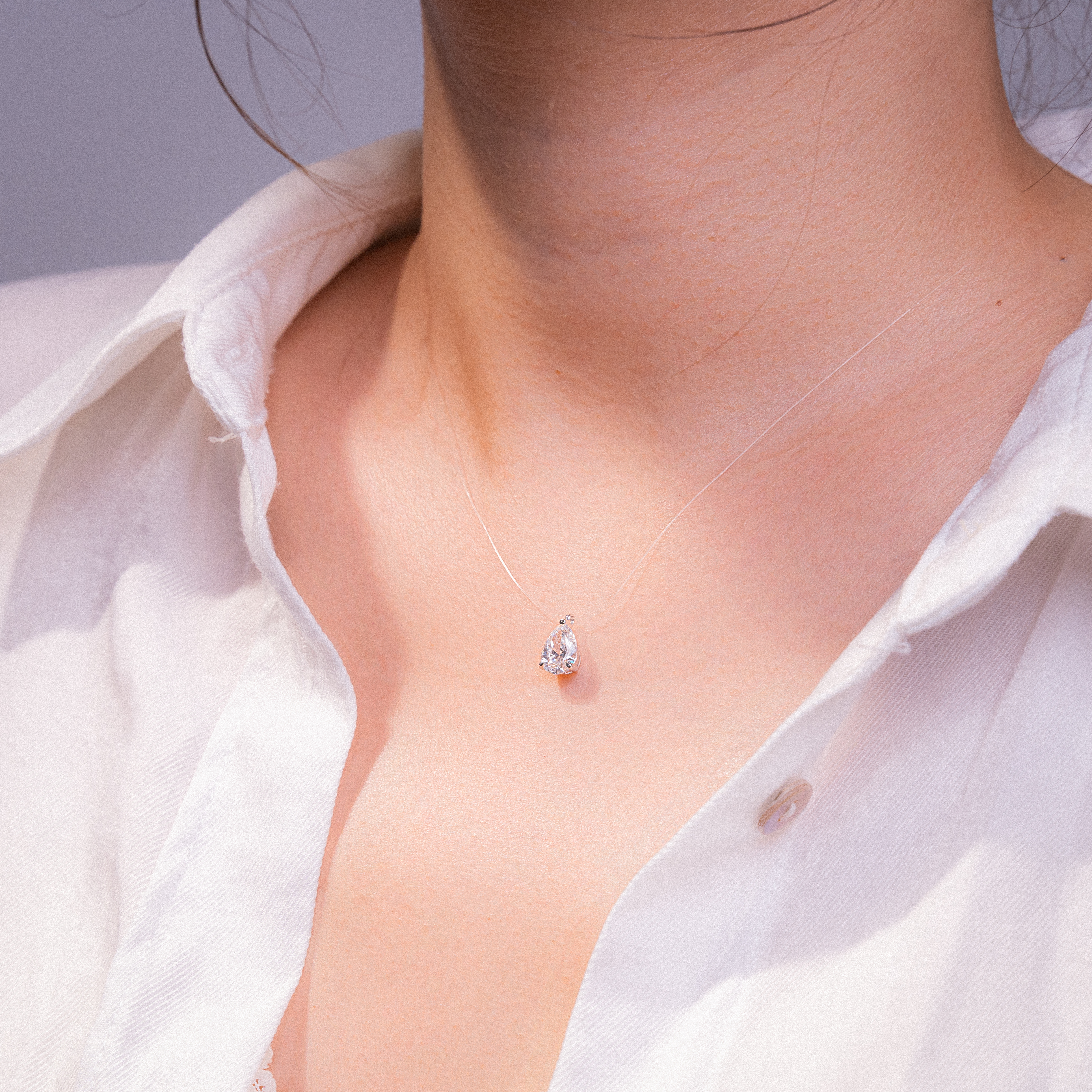 Invisible Chain Pear Cut Solitaire Diamond Pendant Necklace