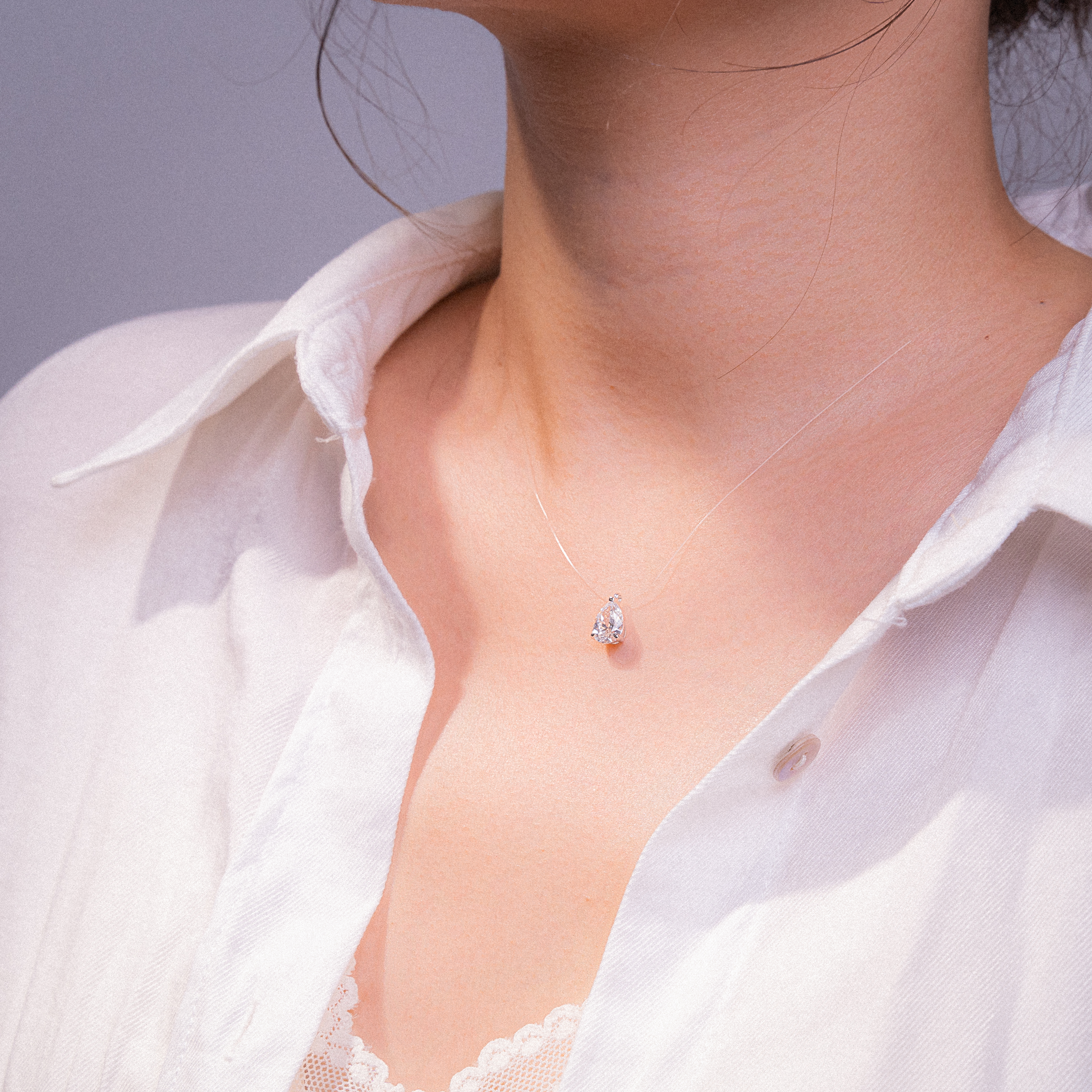 Invisible Chain Pear Cut Solitaire Diamond Pendant Necklace